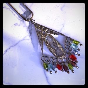 Multi colored metal charm long strand necklace
